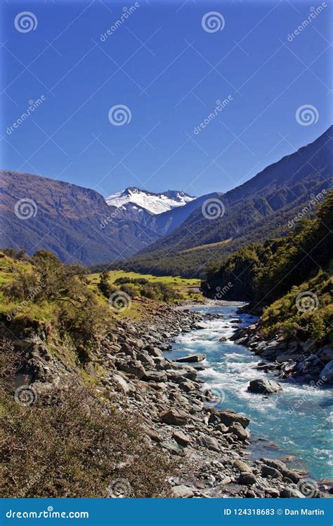 A Blue River Flows Down the Valley through New Zealand Stock Image - Image of island, elevation ...