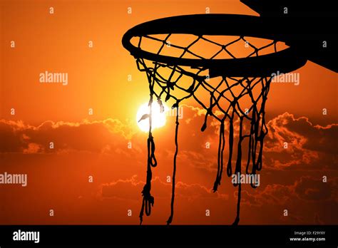 Basketball hoop outdoor in the sunset silhouette Stock Photo - Alamy