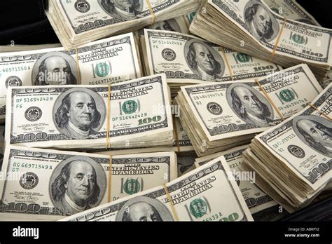 Piles of 100 dollar bills Stock Photo: 7402225 - Alamy