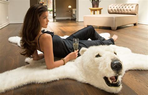 Add some classic white to your home with fluffy polar bear rug - Homecrux