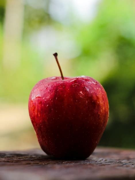 Premium Photo | Red apple with aesthetic blurred background