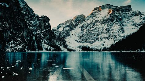 Download wallpaper 1366x768 winter, mountains, floating ice, lake, nature, tablet, laptop ...