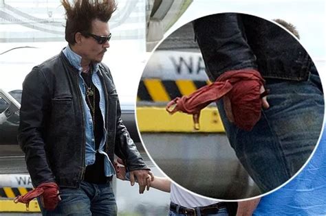 Johnny Depp's unexplained hand injury 'occurred when actor punched wall during fight with Amber ...