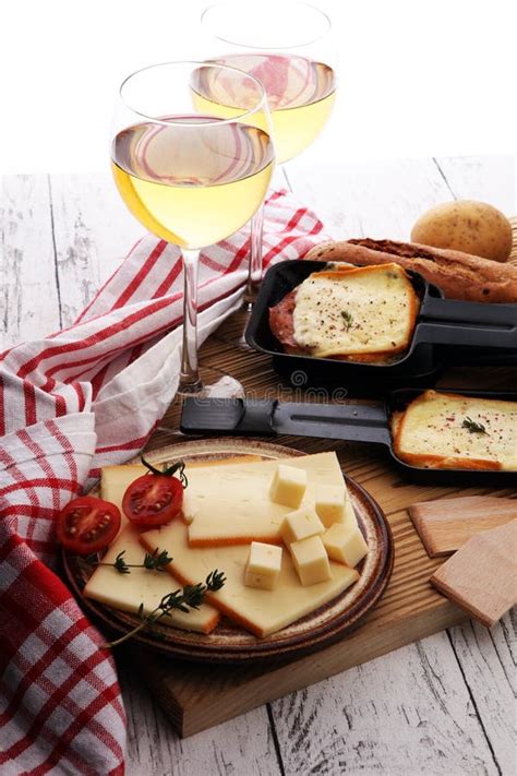 Delicious Traditional Swiss Melted Raclette Cheese On Diced Boil Stock ...