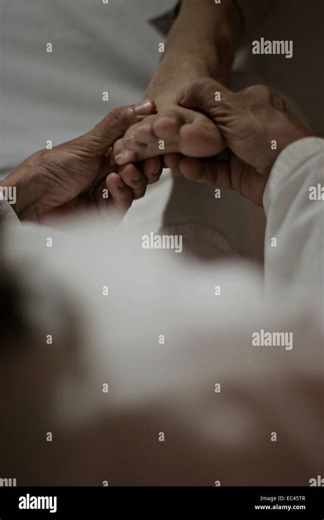 Man getting Foot Massage Stock Photo - Alamy