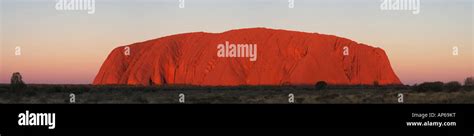 Uluru at sunset Stock Photo - Alamy