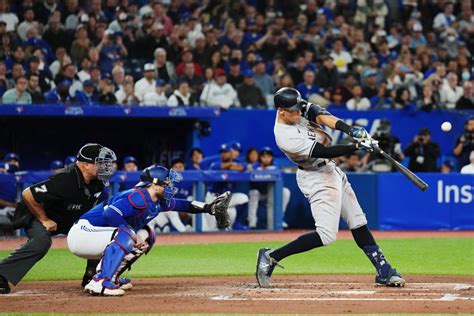 Yankees' Judge hits 61st home run in Toronto, equals AL record