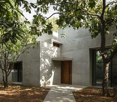 Gallery of Concrete Jungle: Houses That Explore the Contrast Between ...