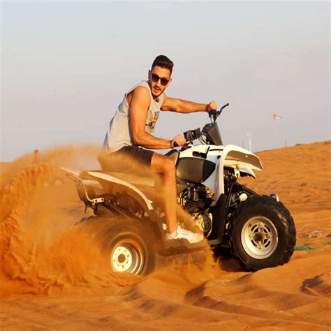 Desert Safari with Quad Bike BBQ Dinner - Seven Tours Dubai