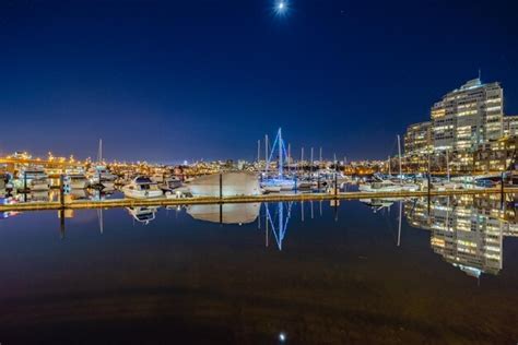 Premium Photo | Sailboats in marina at night