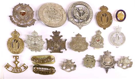 Lot 38 - A Collection of Eighteen Military Badges,