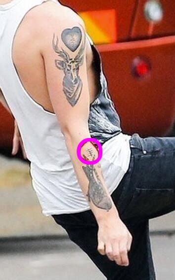 Louis Tomlinson's Half Sleeve Arm Tattoos- PopStarTats