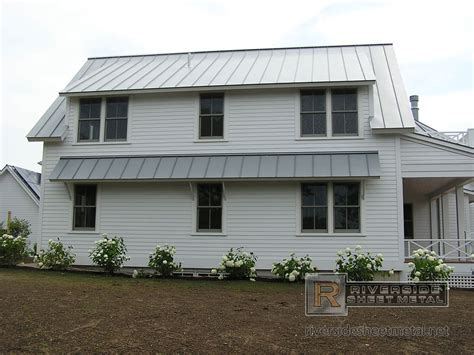 Dove gray standing seam metal roofing panels - Riverside