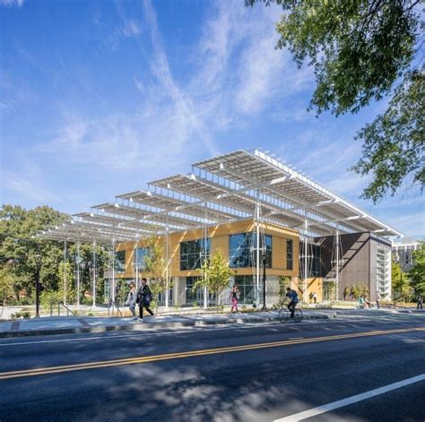 In addition to providing shade, the canopy generates electricity. Its ...