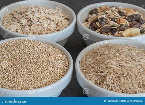 Quinoa, Brown Rice and Oats. Healthy Whole Grain Cereals. Vegan Food Concept Stock Photo - Image ...