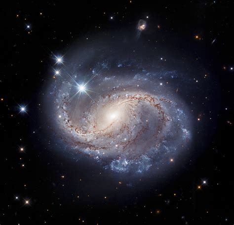 Hubble Captures Majestic Barred Spiral