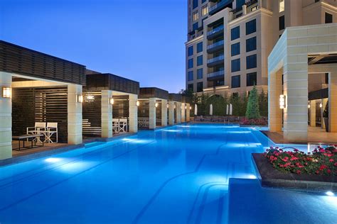 The St. Regis Amman Hotel – Amman, Jordan – Outdoor Pool Evening – TRAVOH