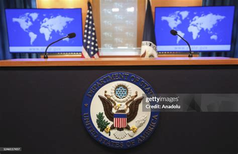 A view of United States Department of State logo and flag in... News ...