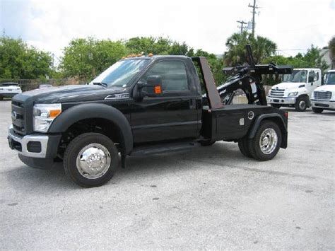 Repo Trucks for Sale (self loader, tow truck boom, stealth)