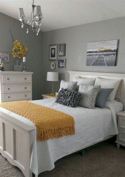 Again, we're seeing some yellow accents in an otherwise grey and white room. This time the ...