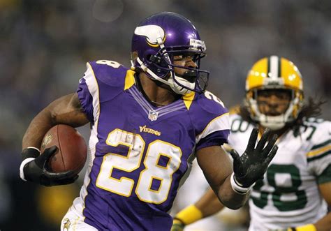 Minnesota's Adrian Peterson finishes nine yards shy of the NFL rushing ...