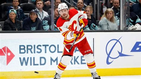 Flames defenceman Andersson listed 'day to day' after being struck by ...