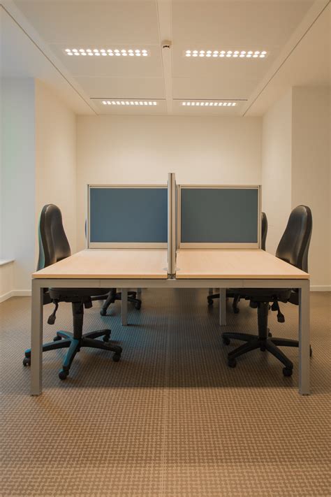 White Cubicle With Rolling Chairs · Free Stock Photo