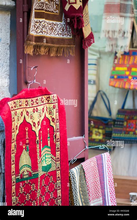 Street market, souvenirs shop with carpets, Old city Jerusalem, Middle ...