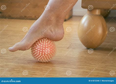 Foot with massage ball stock photo. Image of bedroom - 61872346