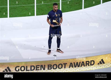 France's Kylian Mbappe poses with the Golden Boot Award after the FIFA ...