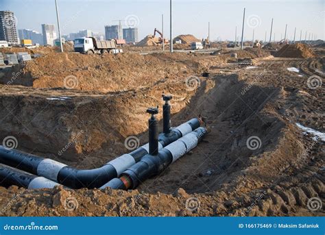 Laying of Underground Storm Sewer Pipes. Installation of Water Main, Sanitary Sewer. Plastic ...