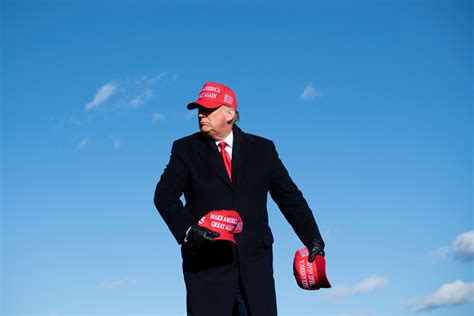 Trump unveils new red Make America Great Again hat that 'he designed ...