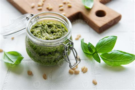 Green basil pesto 15938783 Stock Photo at Vecteezy