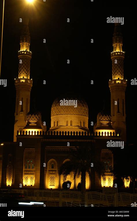 Mosque in Jumeirah Dubai floodlit at night UAE United Arab Emirates ...