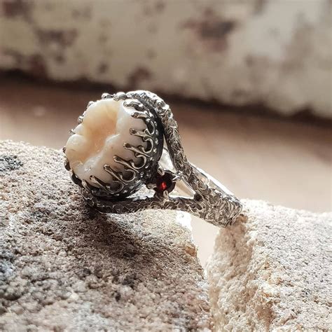 I had the pleasure of creating a custom tooth ring for @missnancydarling 💍 I designed a ring ...