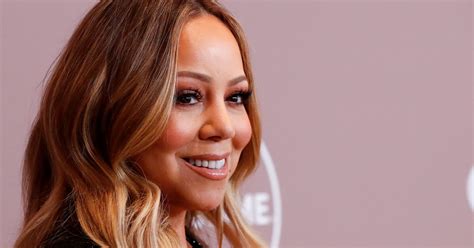 Judge tosses most of lawsuit by Mariah Carey's brother over singer's memoir | Reuters