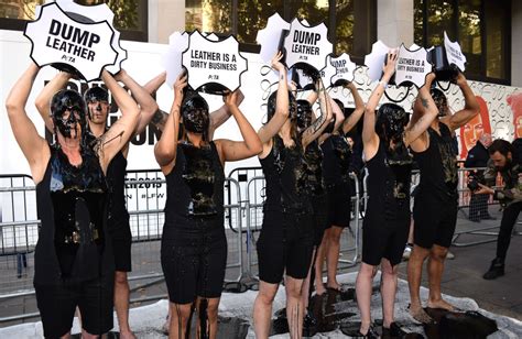 PETA Supporters Stage 'Dirty' Leather Protest at London Fashion Week