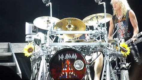 DEF LEPPARD RICK ALLEN DRUM SOLO with RICK SAVAGE - YouTube