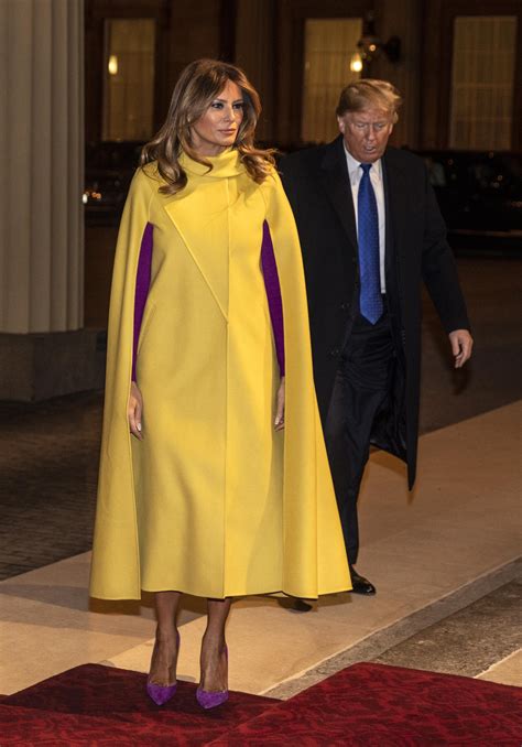 Melania Trump Pairs $7,700 Bright Yellow Cape Coat with Magenta Dress ...