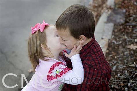 We told her to give her brother a kiss...I was kind of thinking on the cheek, but whatever ...