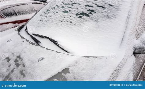 Frozen snowy car window stock image. Image of winter - 98903841