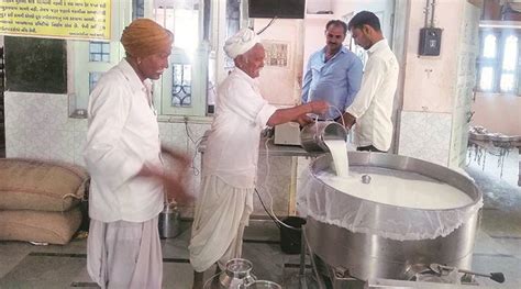 Maharashtra dairy farmers dump milk on road in protest against low ...