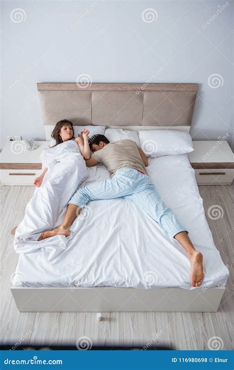 The Woman and Man in the Bedroom Stock Photo - Image of quarrel, home ...