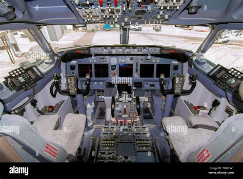 A view of the cockpit of a large commercial airplane a cockpit . Cockpit view of a commercial ...