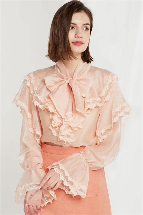 Pin by Veronica on Ropa | Ruffle blouse, Women ruffle blouse, Blouse