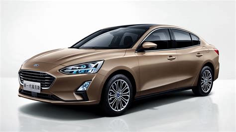 Download Car Brown Car Sedan Vehicle Ford Focus Titanium Sedan HD Wallpaper