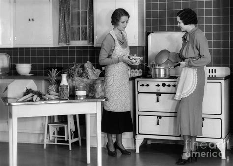 Women Cooking In Kitchen, C.1930s Photograph by H. Armstrong Roberts/ClassicStock