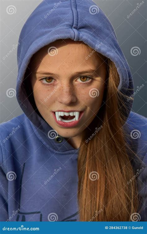 Teenage Girl with Vampire Teeth Stock Photo - Image of fantasy, look: 284362738