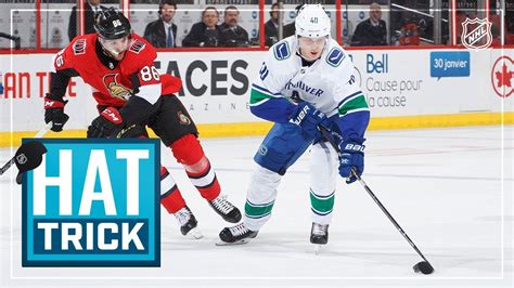 Elias Pettersson; NHL rookie leader suffers injury in awkward collision ...