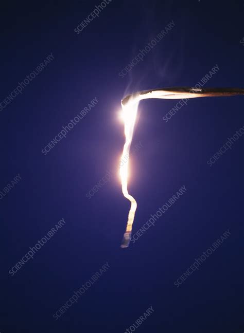 Magnesium ribbon burning - Stock Image - A510/0206 - Science Photo Library